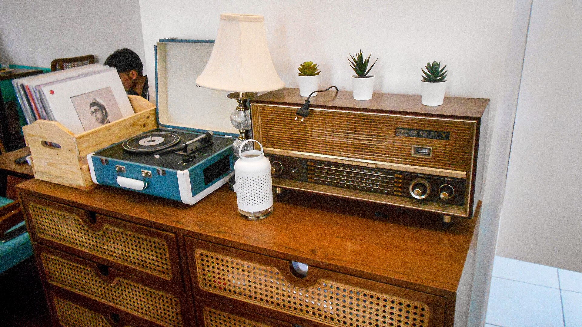 A vinyl turntable and retro radio player